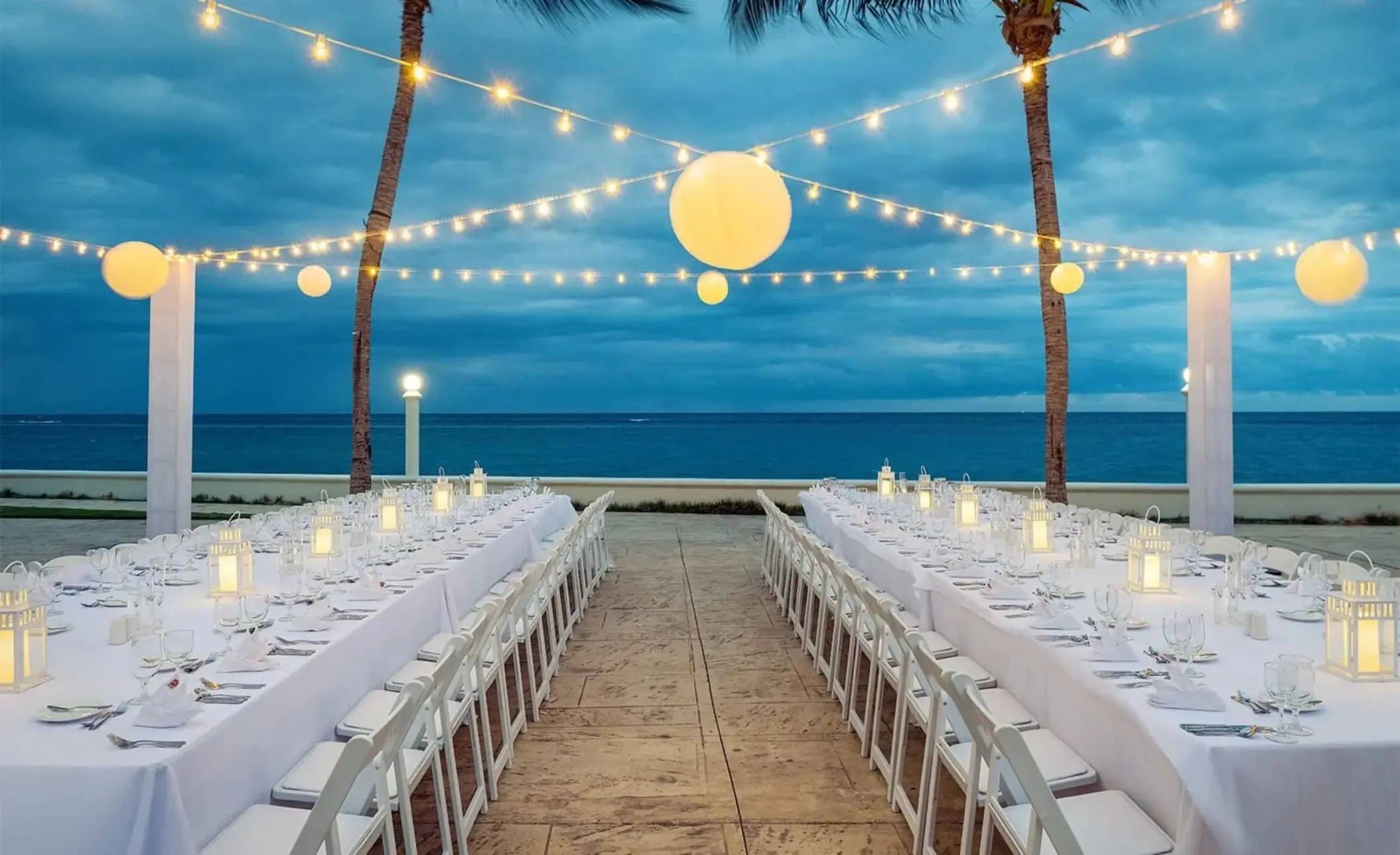 Oceanfront wedding reception setup on Starlight Terrace at Moon Palace Jamaica, Ocho Rios