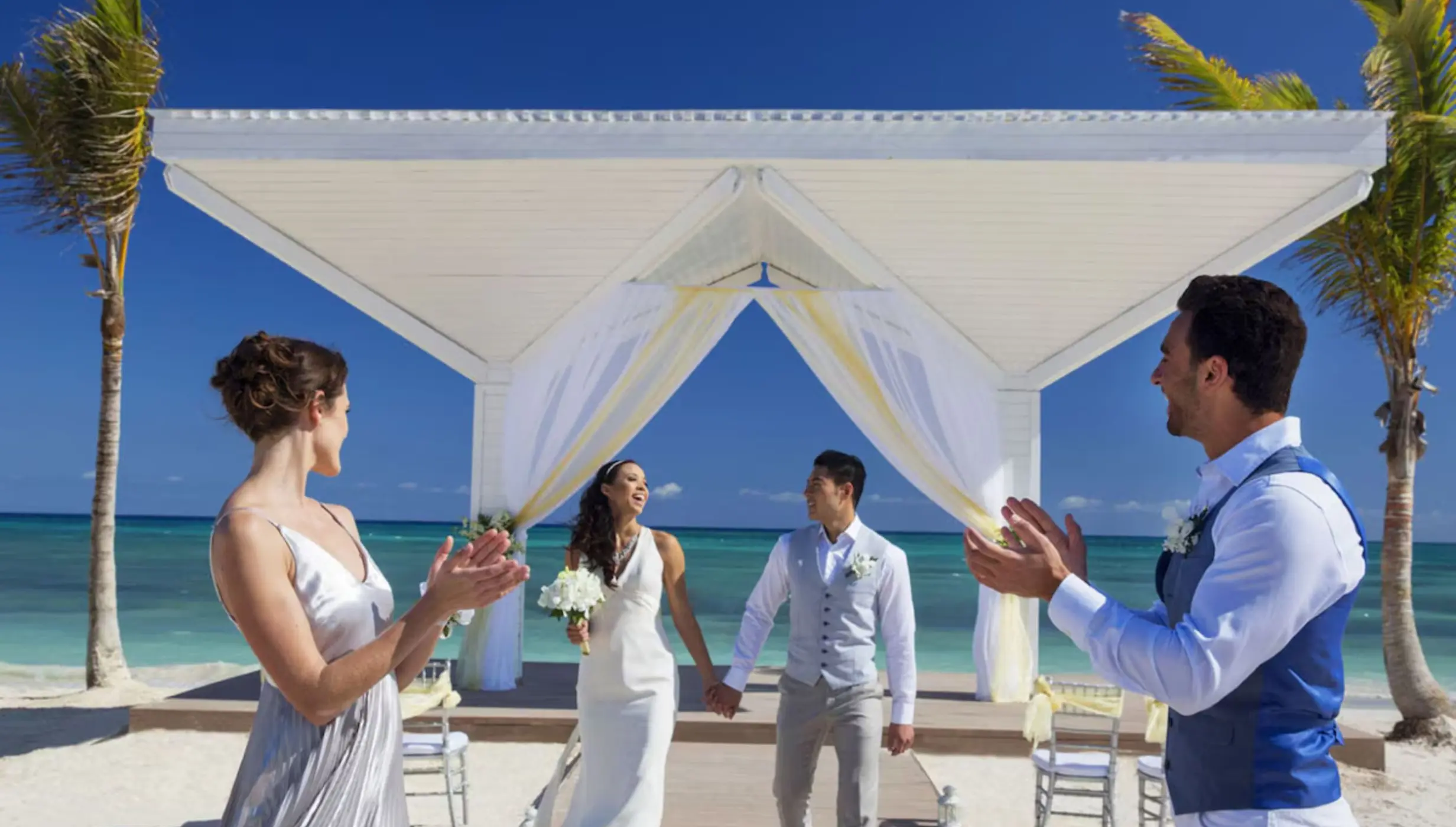 bride and groom and guests at Mystique Holbox by Royalton