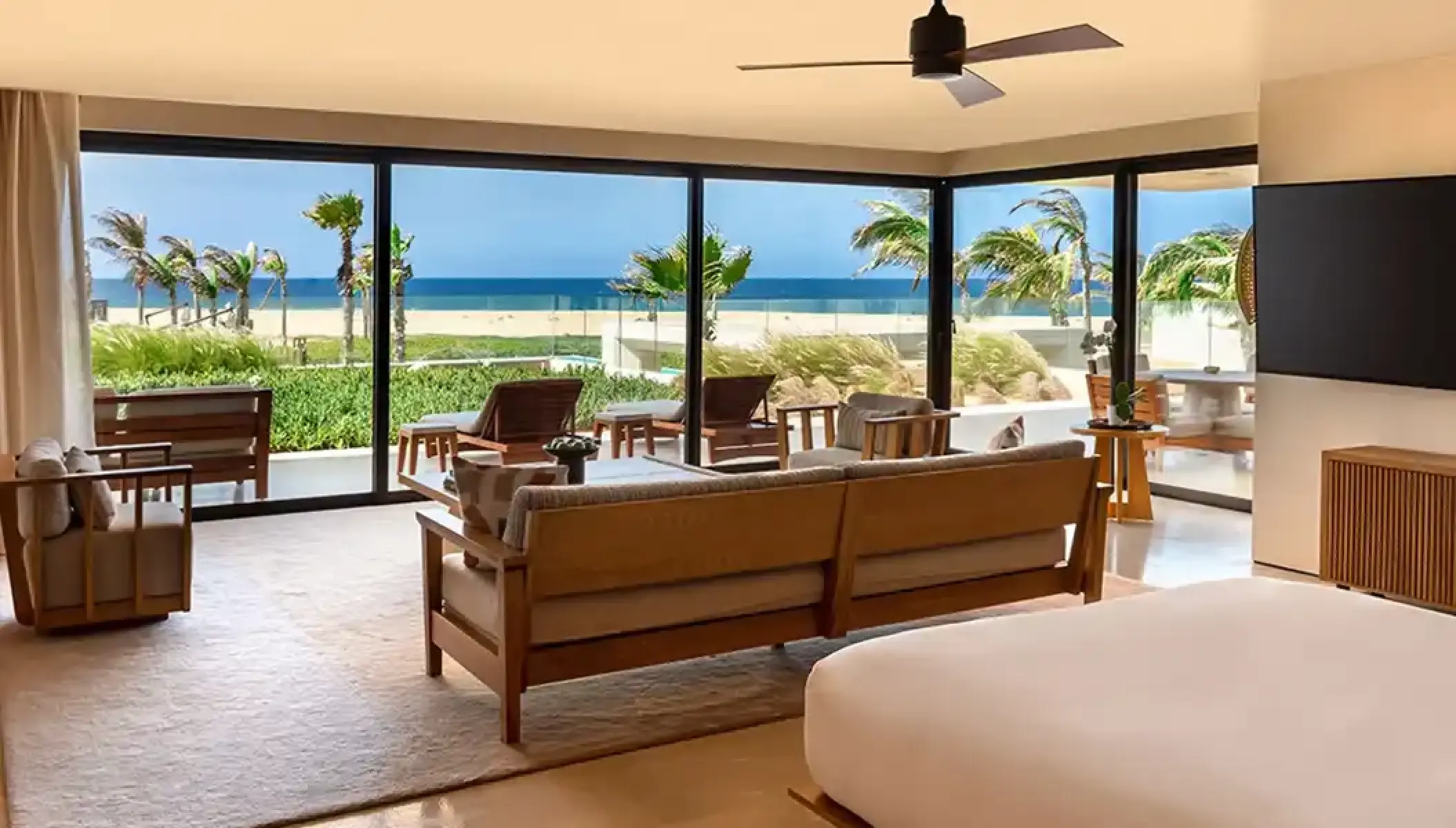 Nobu Los Cabos oceanview suite with floor-to-ceiling windows and beach views, Cabo San Lucas