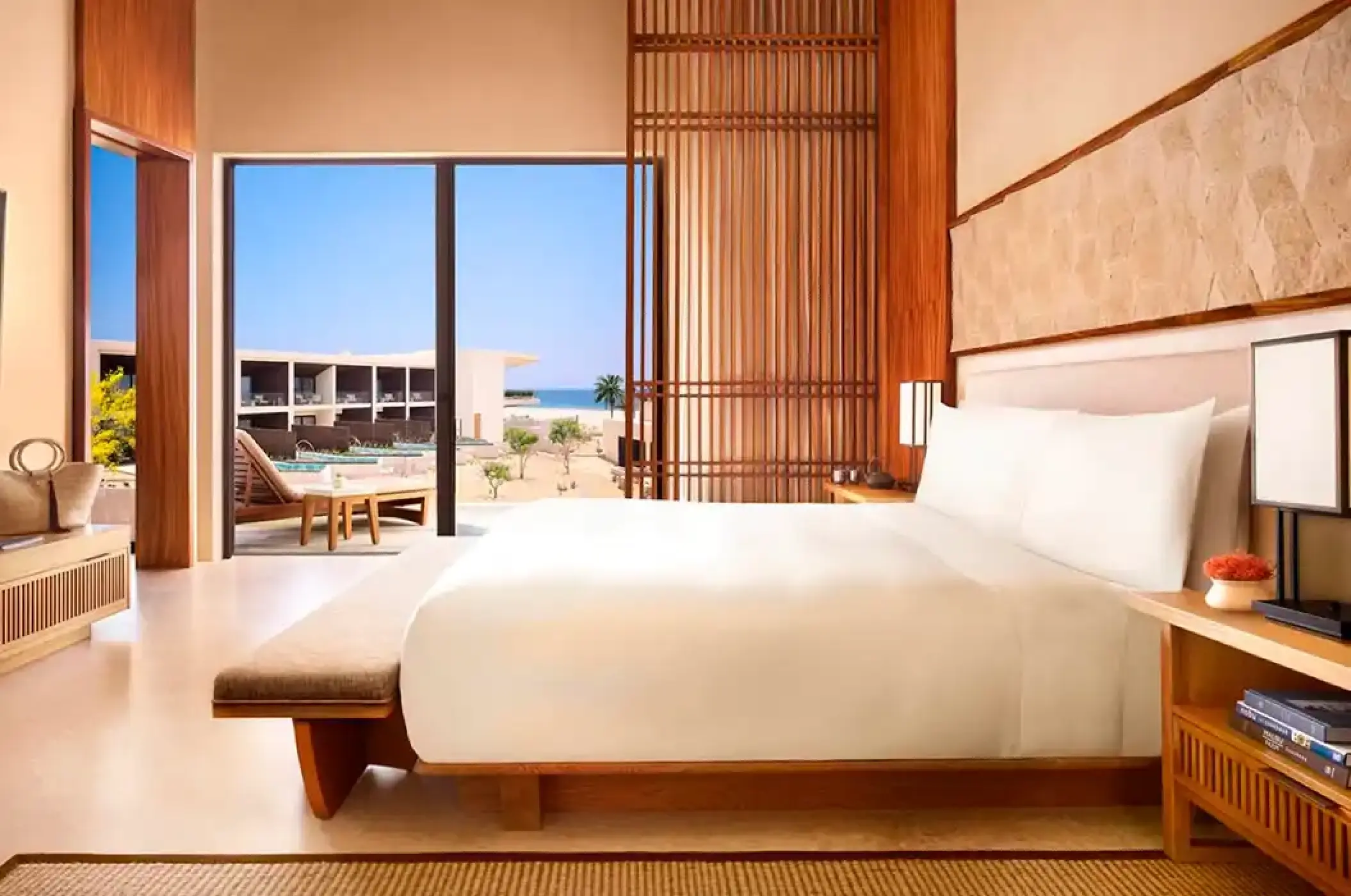 Modern minimalist guest suite with a private terrace at Nobu Hotel, Cabo San Lucas