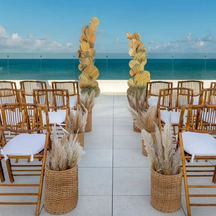 Rooftop wedding ceremony at Ocean Allure Costa Mujeres, Cancun