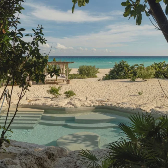 outdoor pool on the beach at Palmaia - The House of AiA