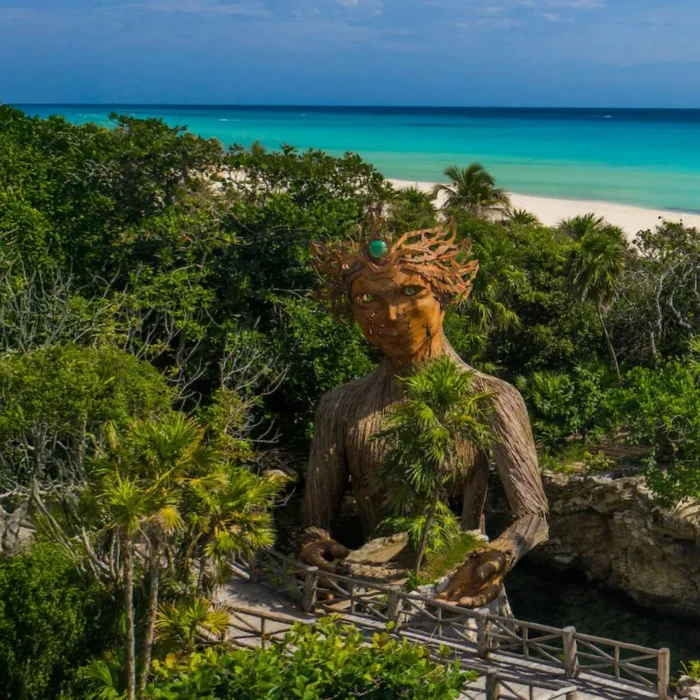 Beach with sculpture at Palmaia - The House of AiA