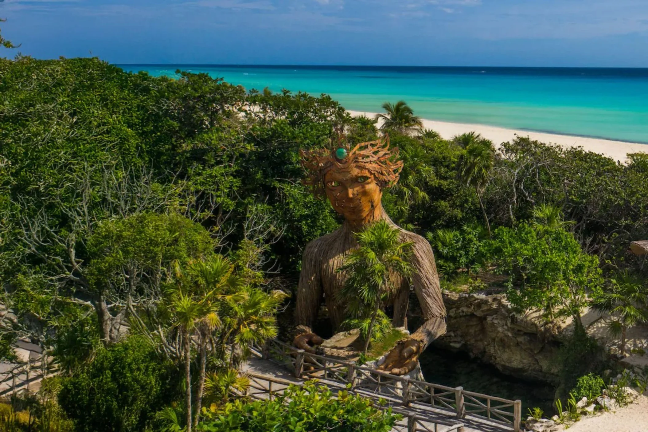 Beach with sculpture at Palmaia - The House of AiA