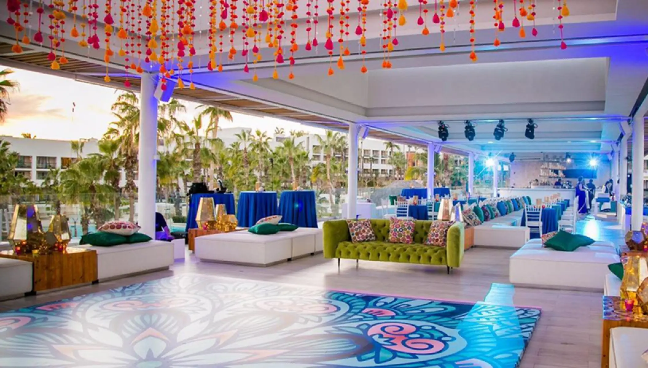 Colorful wedding reception setup at Gaby Sky Bar in Paradisus Los Cabos, Cabo San Lucas
