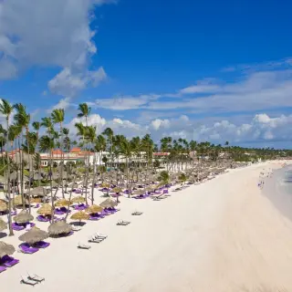 Aerial view of the white sand beach and turquoise water at Paradisus Palma Real, Punta Cana