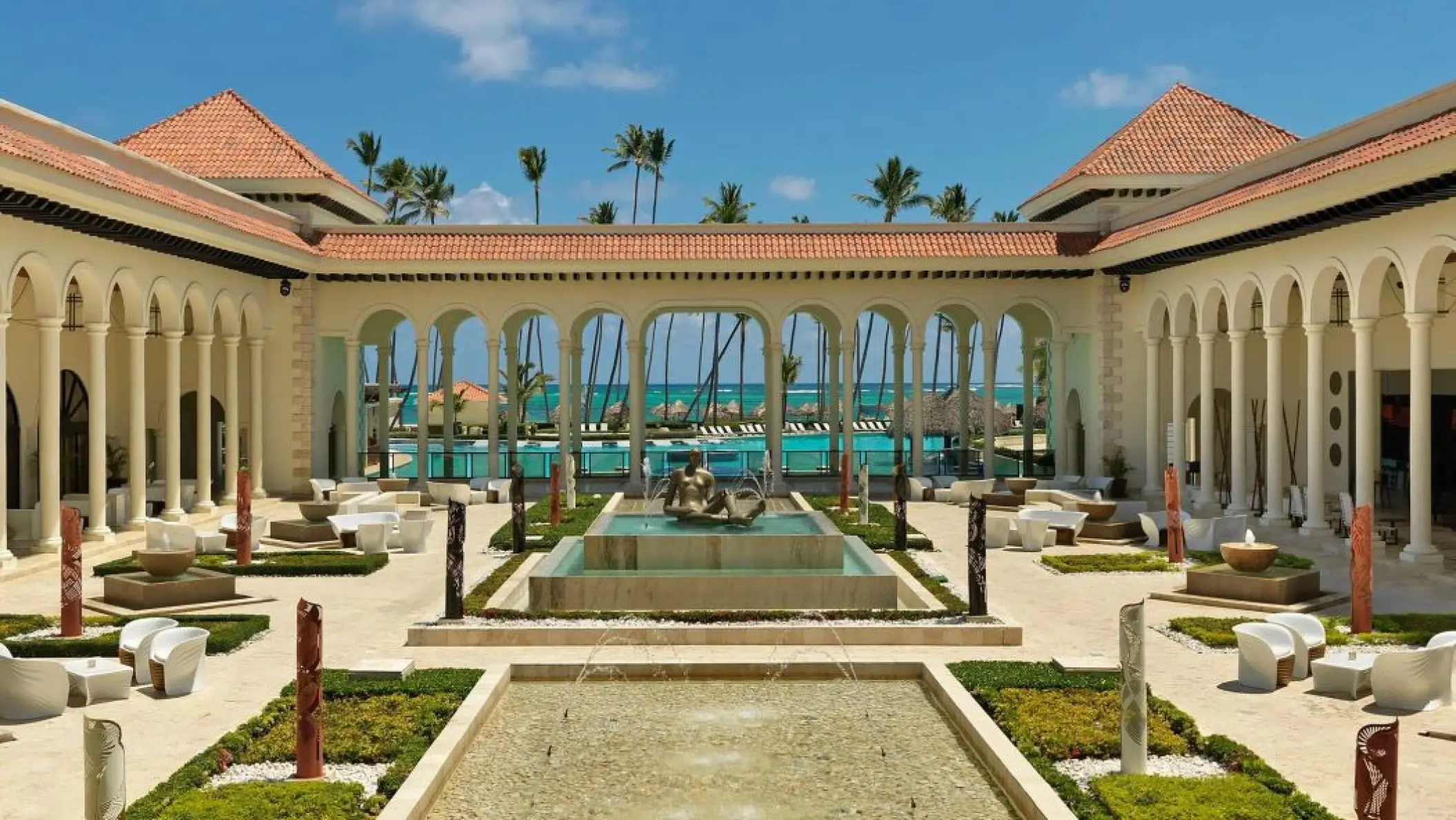 Colonial Plaza courtyard with fountains and arches at Paradisus Palma Real, Punta Cana