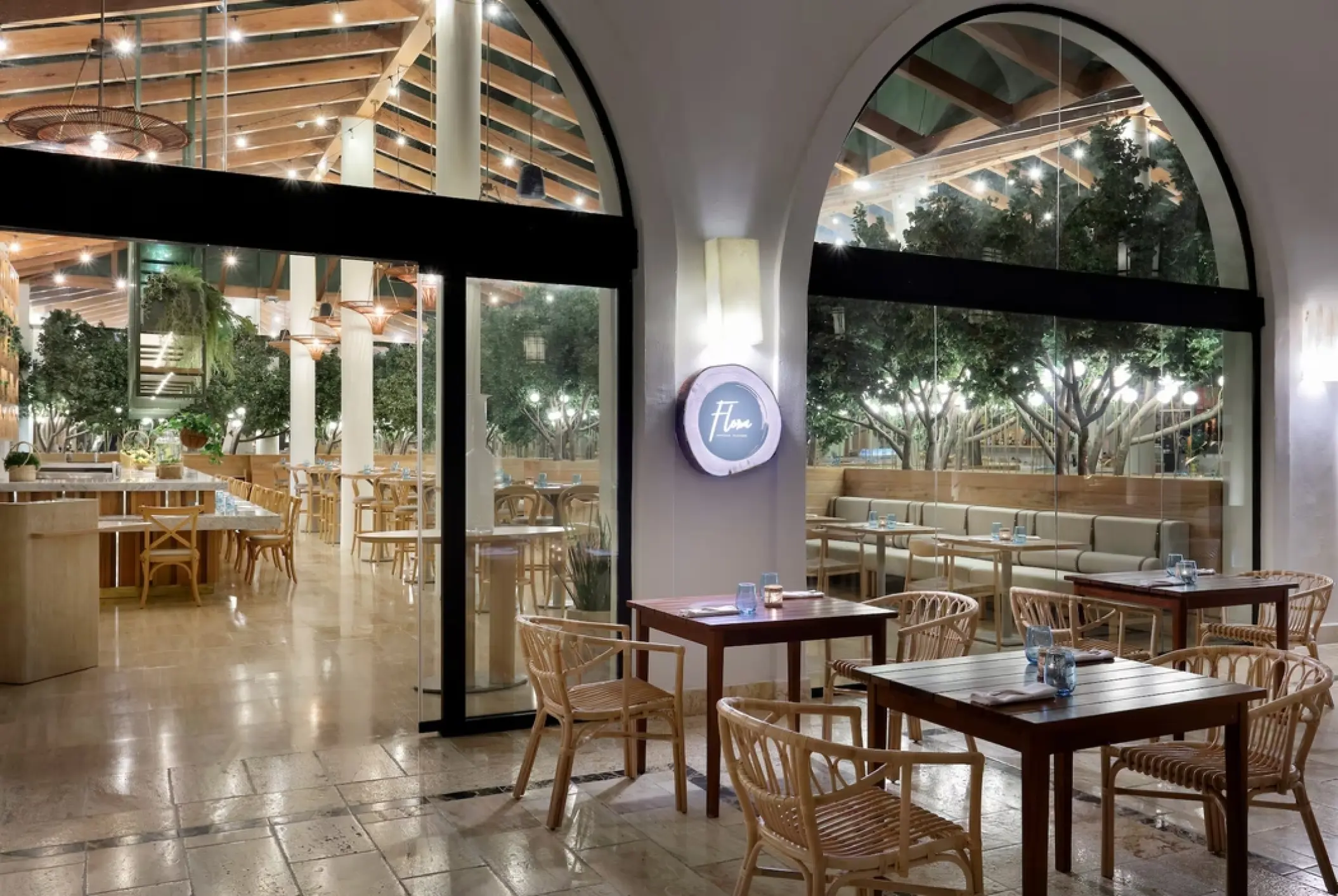 Flora restaurant indoor and outdoor seating area at Paradisus Palma Real, Punta Cana