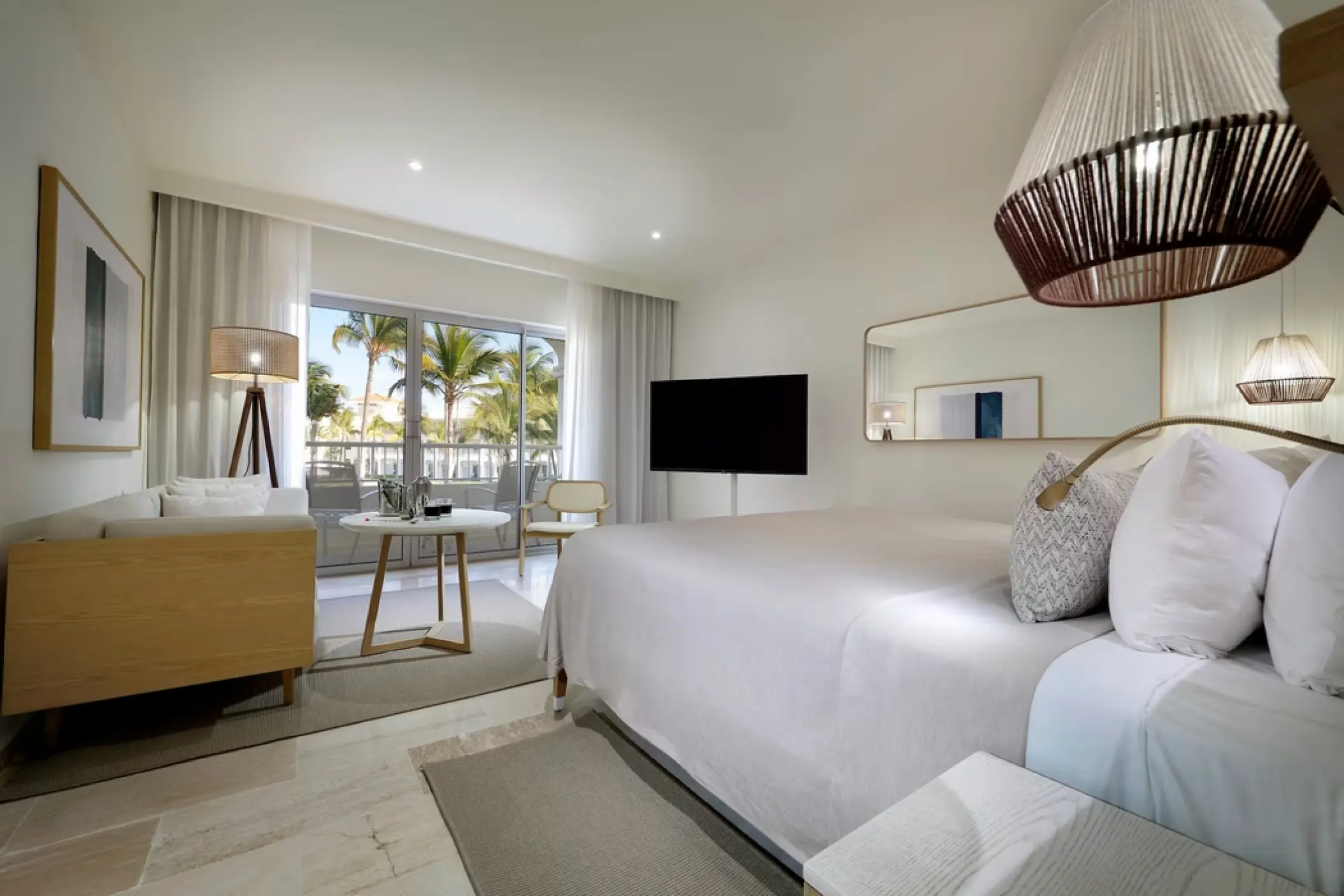 Junior Suite Garden View with modern decor and private balcony at Paradisus Palma Real, Punta Cana