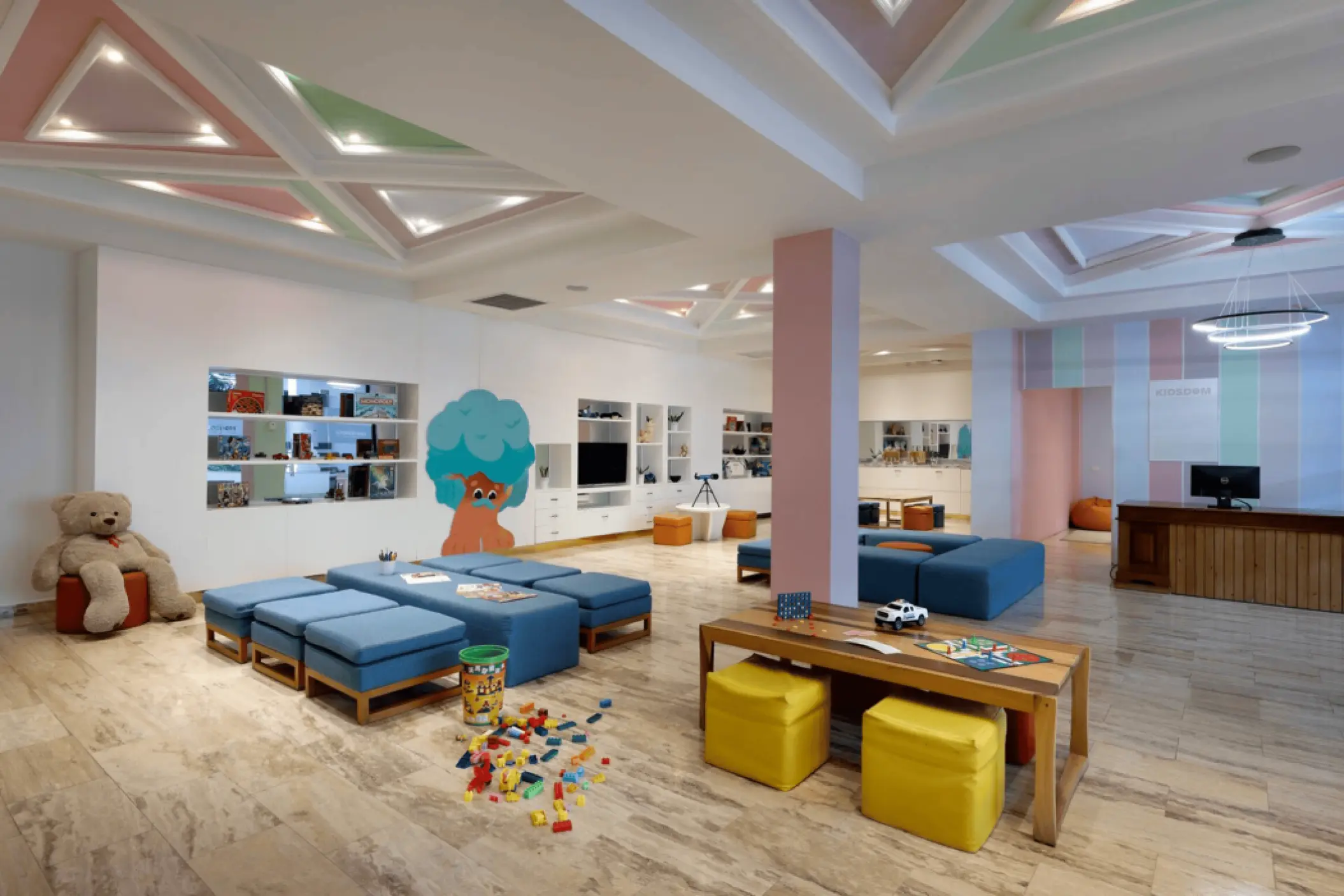 Colorful Kidsdom play area with toys and seating at Paradisus Palma Real, Punta Cana