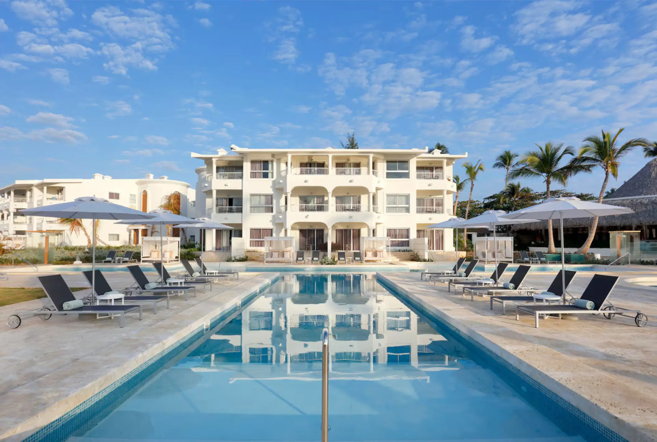 Paradisus Palma Real outdoor lap pool and suite buildings, Punta Cana