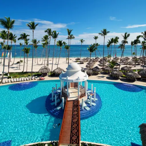 Poolside gazebo and white sand beach at Paradisus Palma Real, Punta Cana