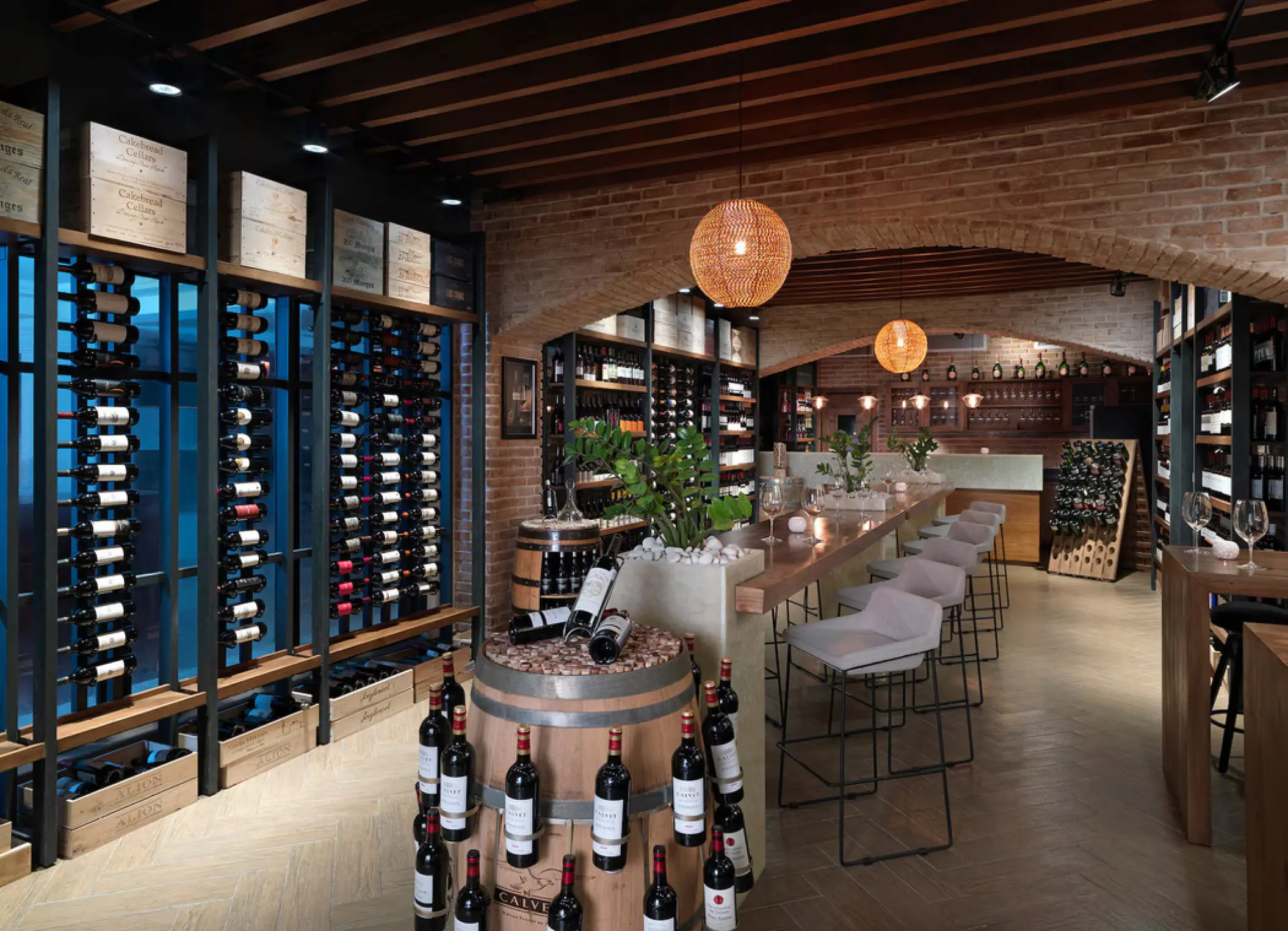 The Winery indoor bar with brick arches and wine racks at Paradisus Palma Real, Punta Cana