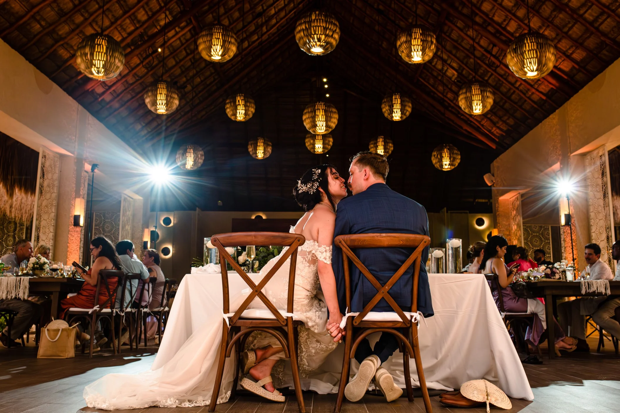 Bride, groom and guests at the wedding reception at Paradisus Playa Del Carmen