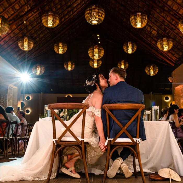 Bride, groom and guests at the wedding reception at Paradisus Playa Del Carmen
