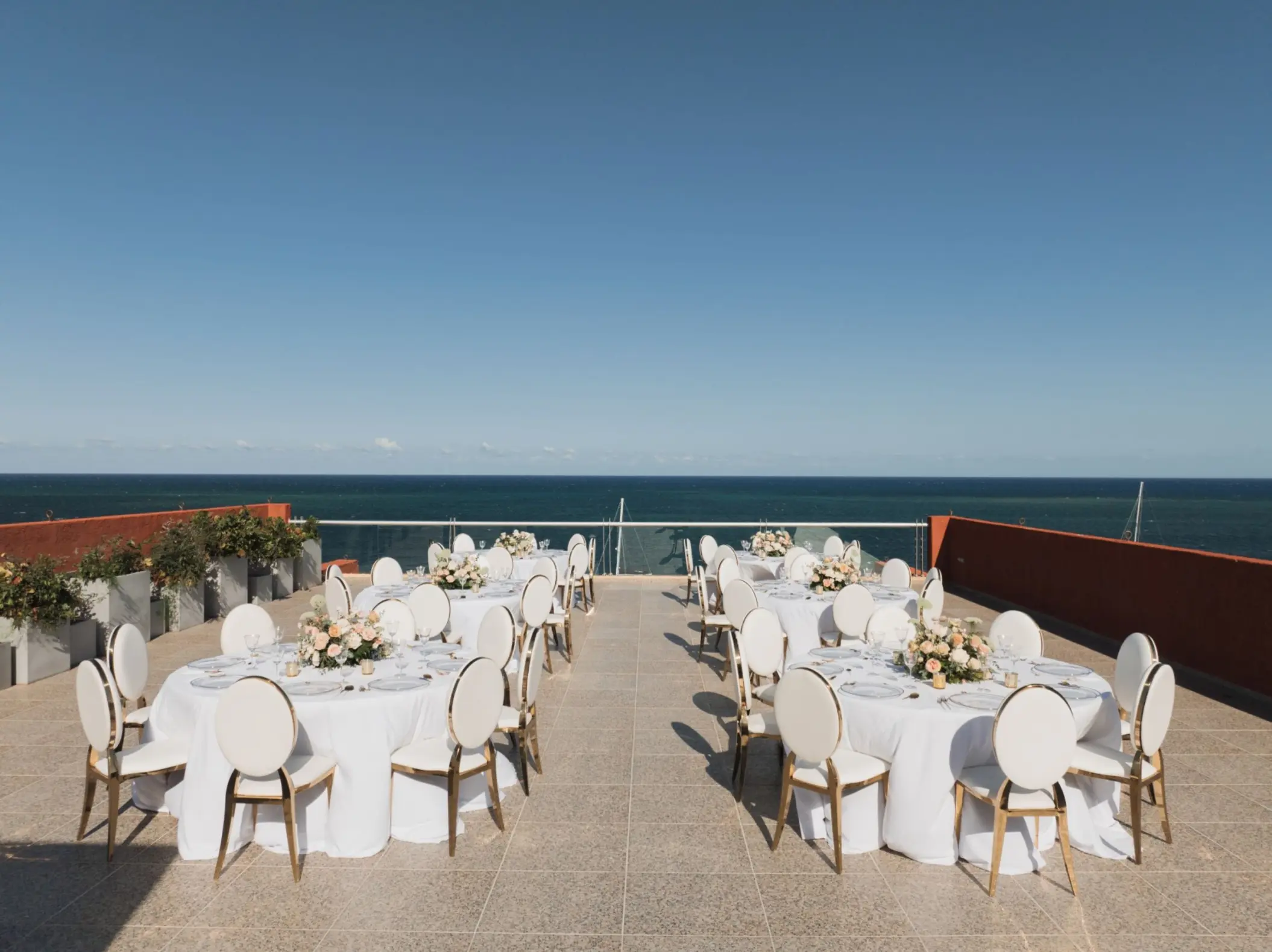 Rooftop wedding reception with ocean views at Royalton Reserve Paraiso de la Bonita, Riviera Maya
