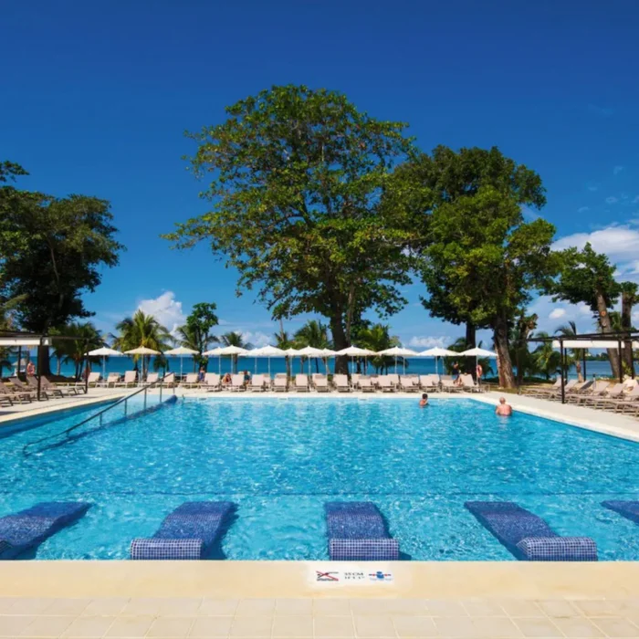 pool with in-pool loungers at Riu Palace Tropical Bay