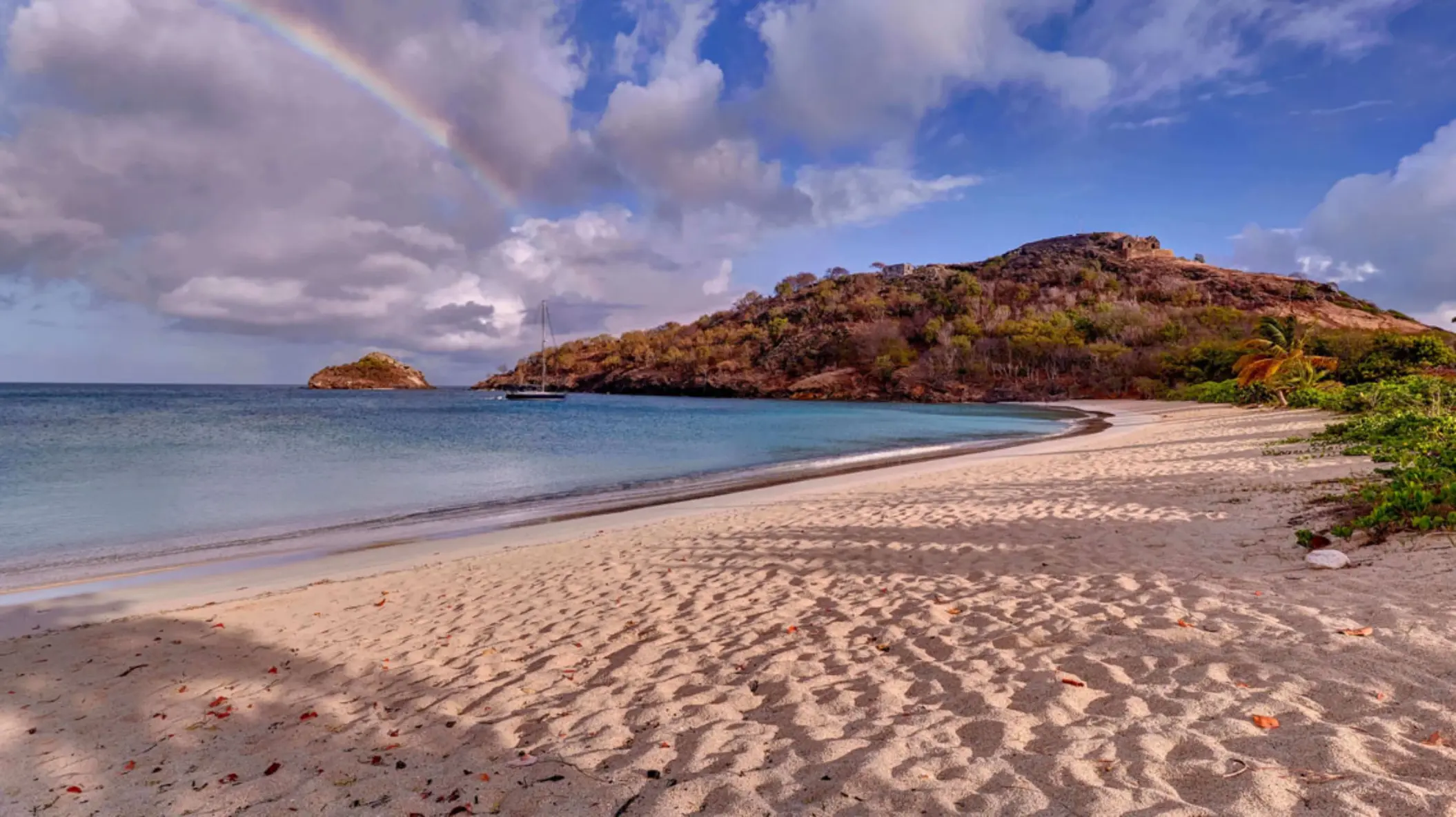 Rainbow over the private beach at Royalton Antigua, Five Islands Village