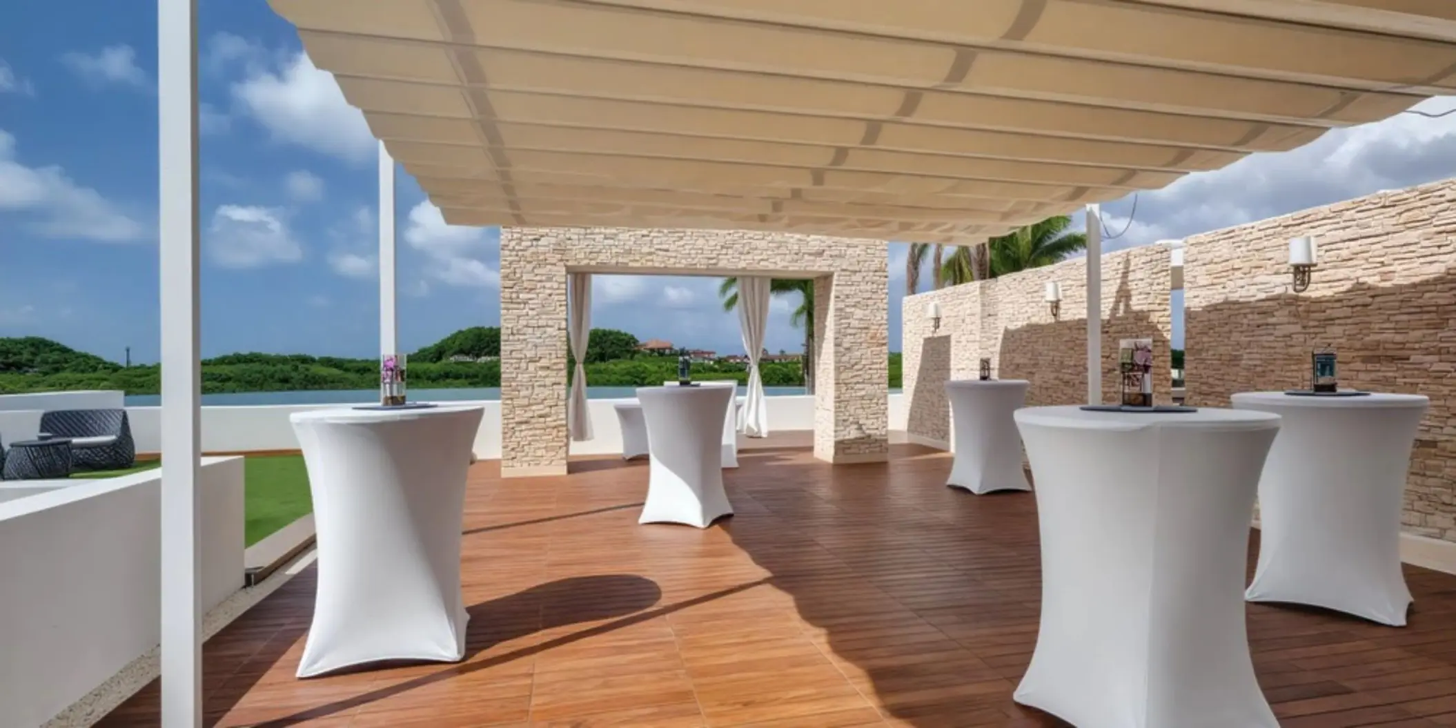Sky wedding cocktail reception setup on a terrace at Royalton Antigua, Five Islands Village