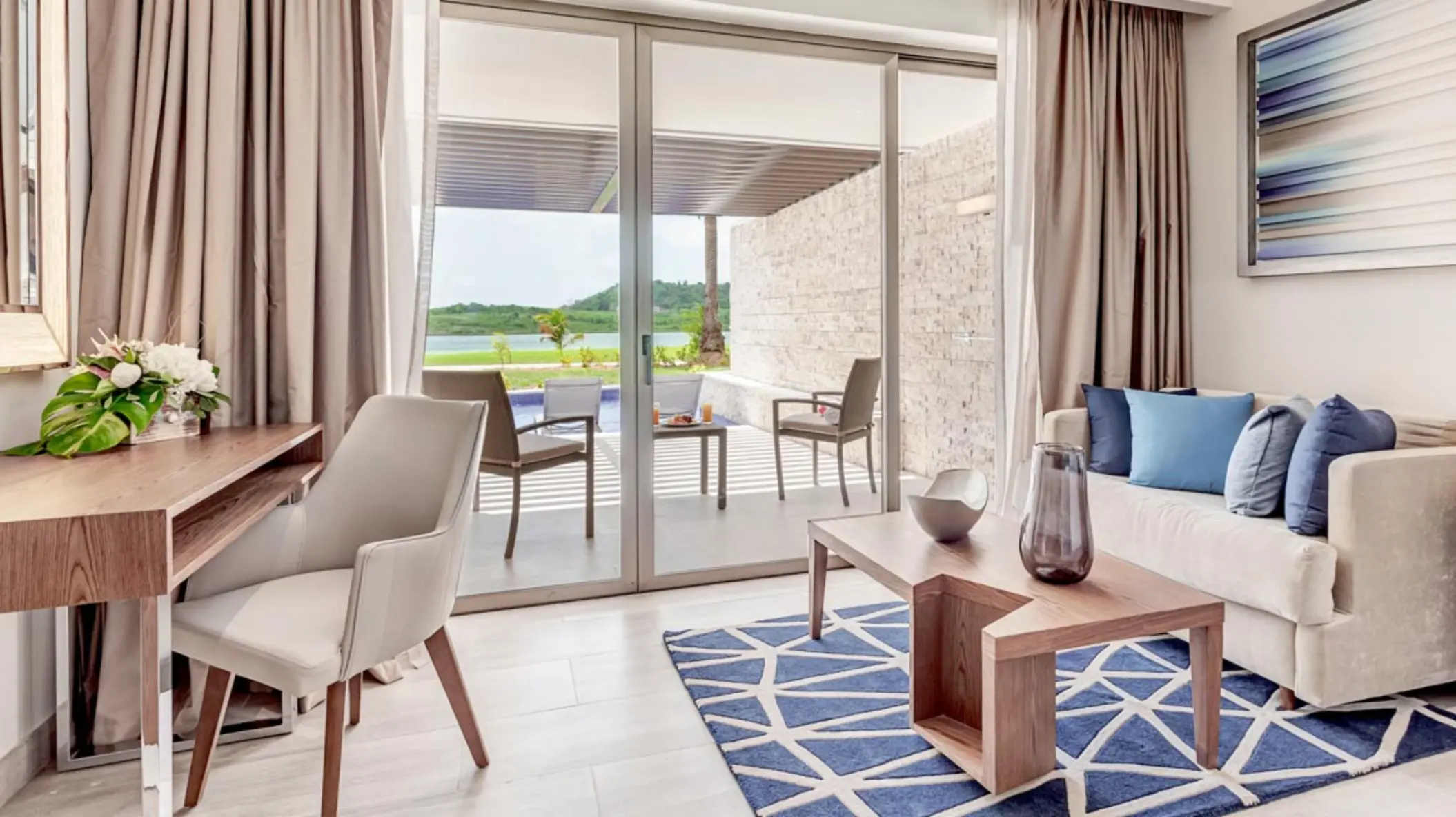 Swim-out suite living area and private terrace at Royalton Antigua, Five Islands Village