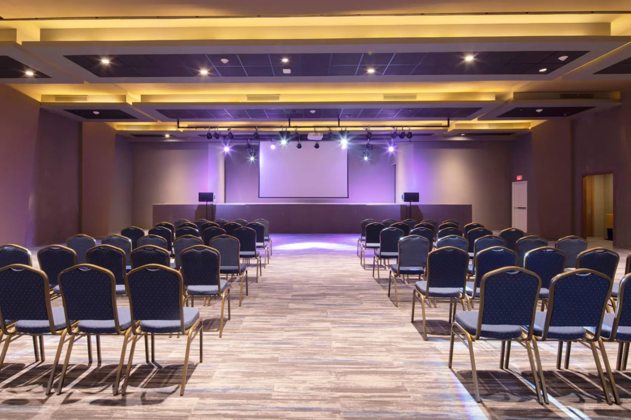 Fort Barrington event space theater setup with stage and seating at Royalton Antigua, Five Islands Village