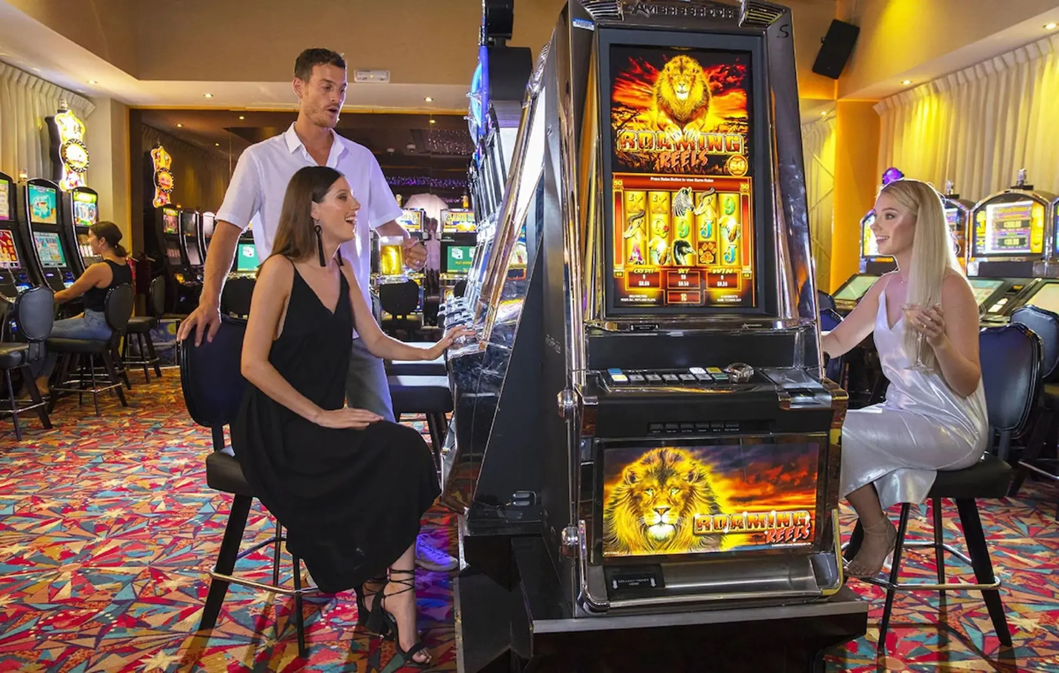 Guests playing slot machines at the Royalton Bavaro casino, Punta Cana
