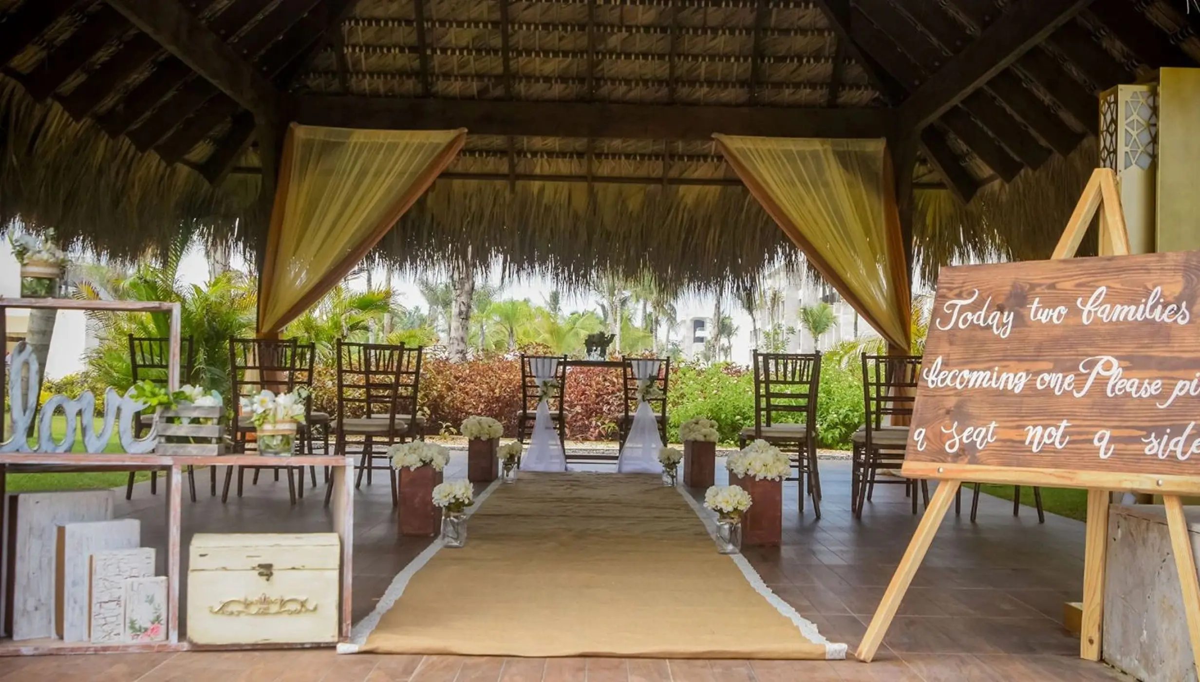 Garden gazebo wedding ceremony setup with rustic decor at Royalton Bavaro, Punta Cana