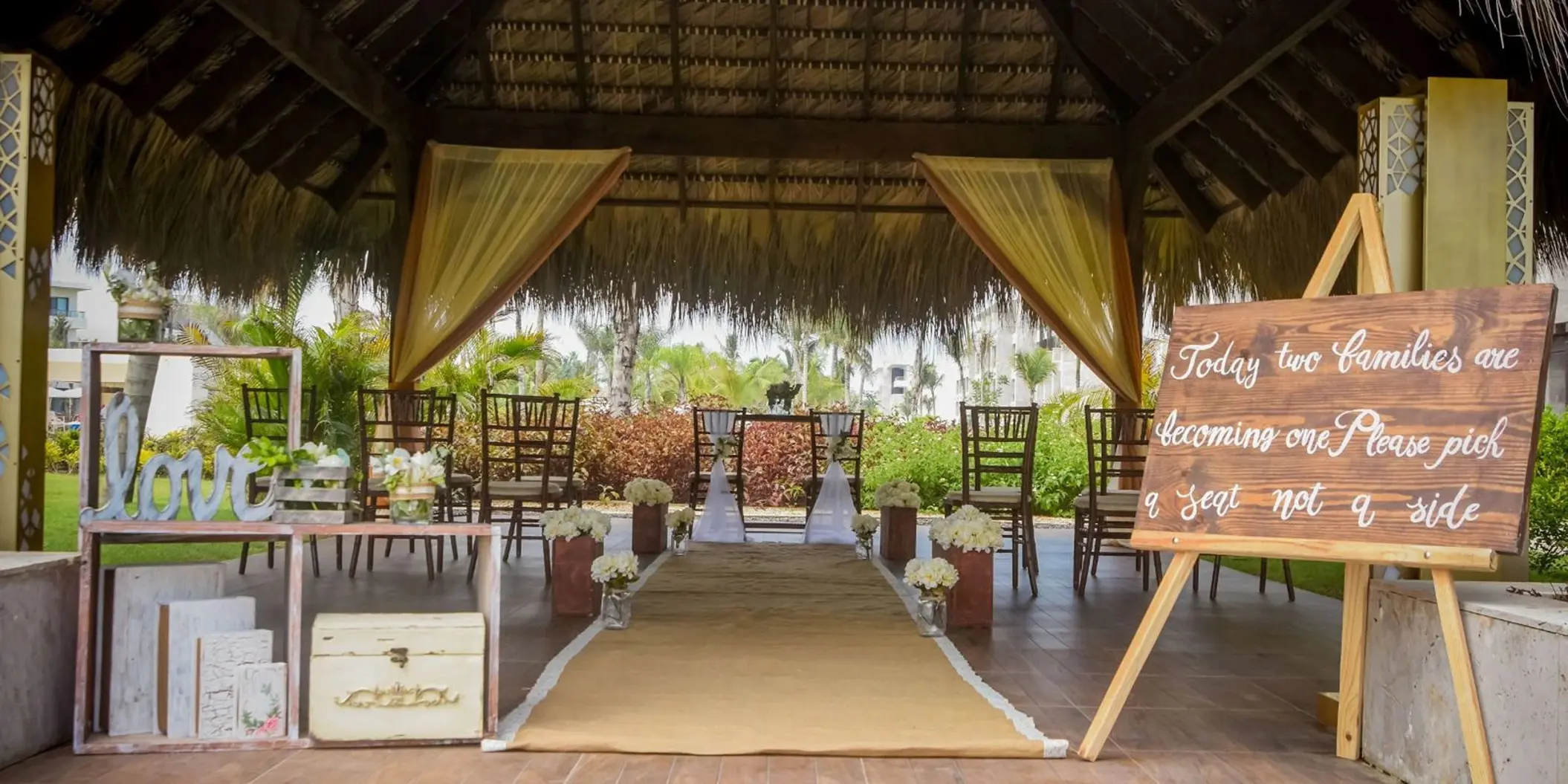 Garden gazebo wedding ceremony setup with rustic decor at Royalton Bavaro, Punta Cana