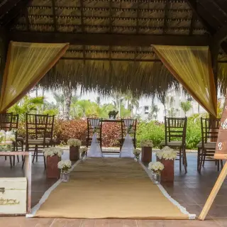 Garden gazebo wedding ceremony setup with rustic decor at Royalton Bavaro, Punta Cana