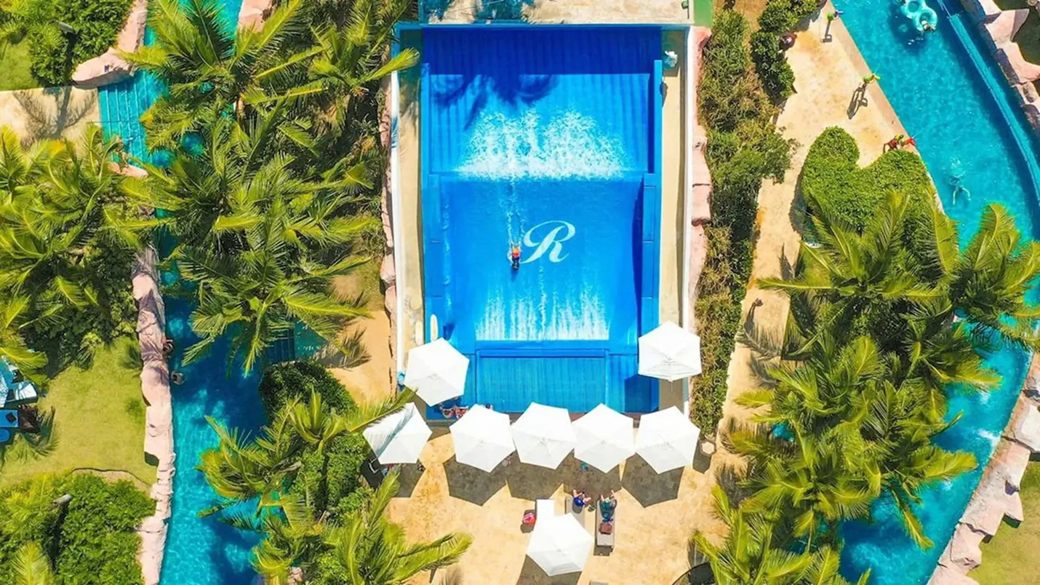 Aerial view of the FlowRider surf machine and lazy river at Royalton Bavaro, Punta Cana