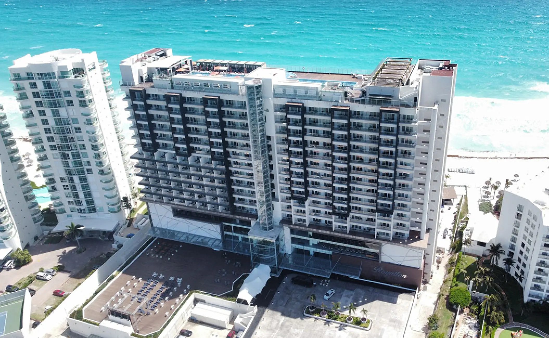 Aerial view of Royalton CHIC Cancun tower and beachfront, Cancun