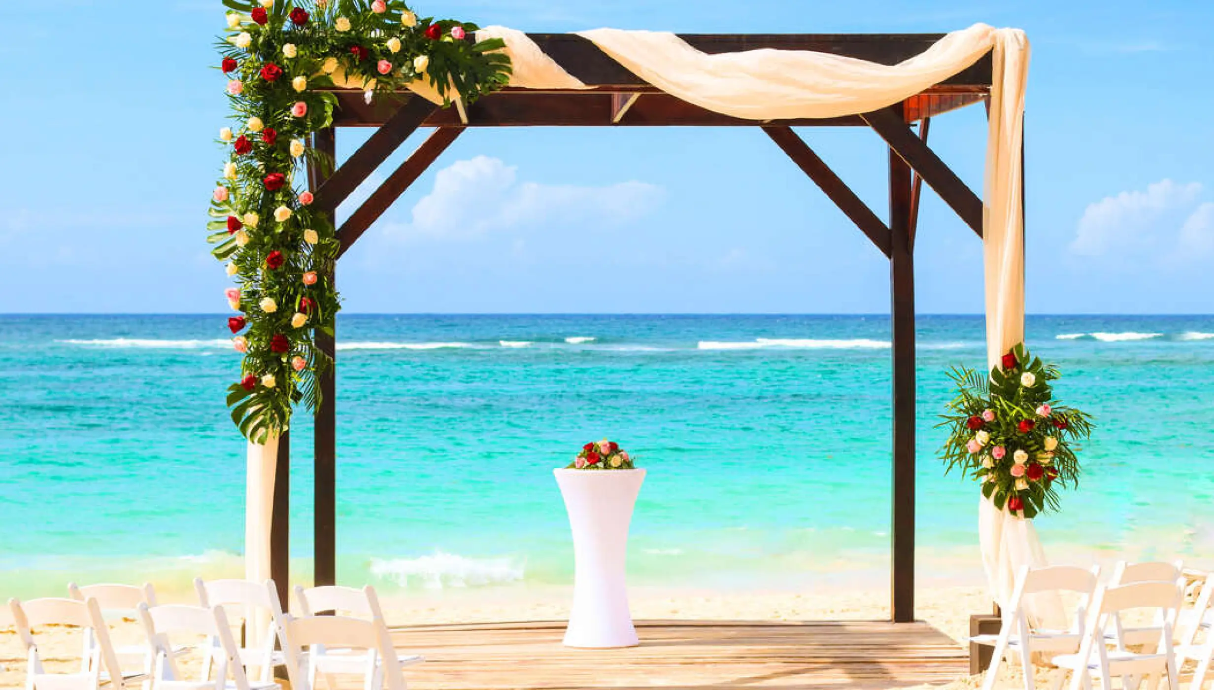 Beachfront wedding ceremony arch at Royalton CHIC Punta Cana, Punta Cana
