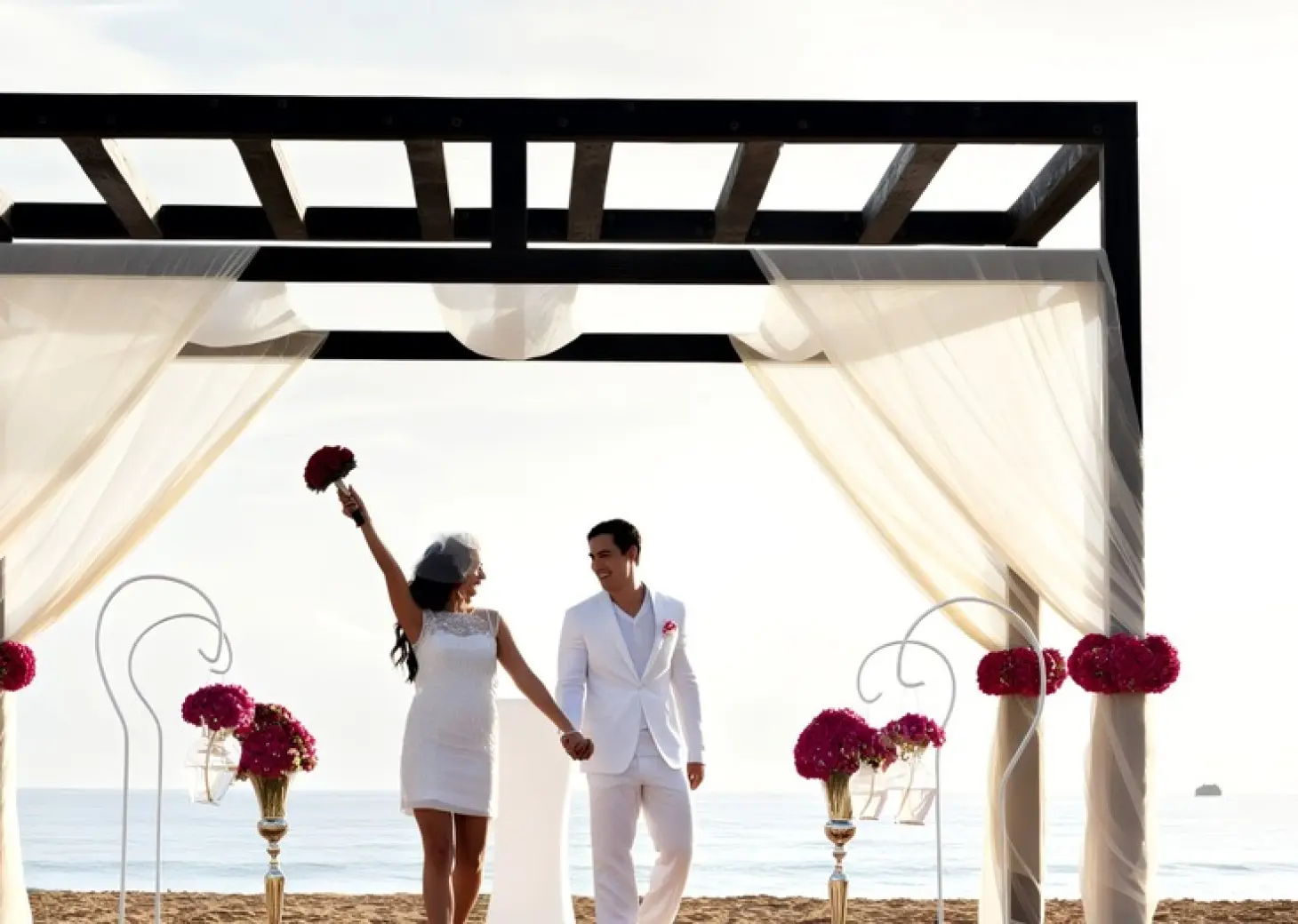 bride and groom at the beach gazebo at Royalton CHIC Punta Cana