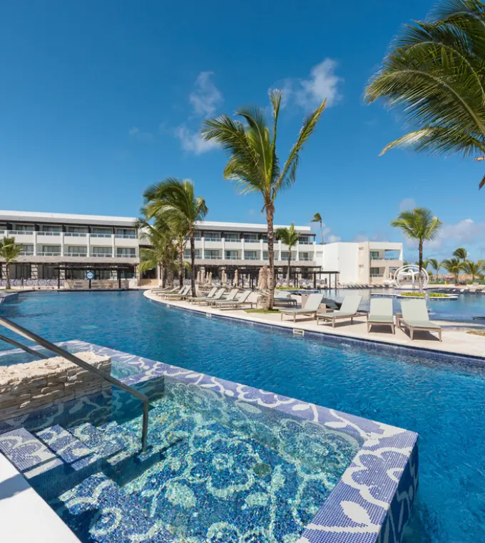 Main swimming pool and sun loungers at Royalton CHIC Punta Cana