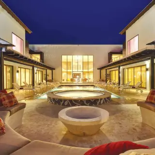 Private CHIC Mansion courtyard with pool and lounge area at Royalton CHIC Punta Cana