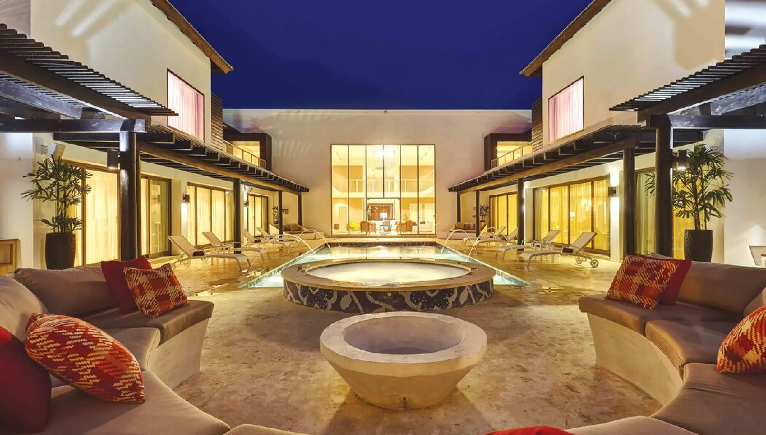 Private CHIC Mansion courtyard with pool and lounge area at Royalton CHIC Punta Cana