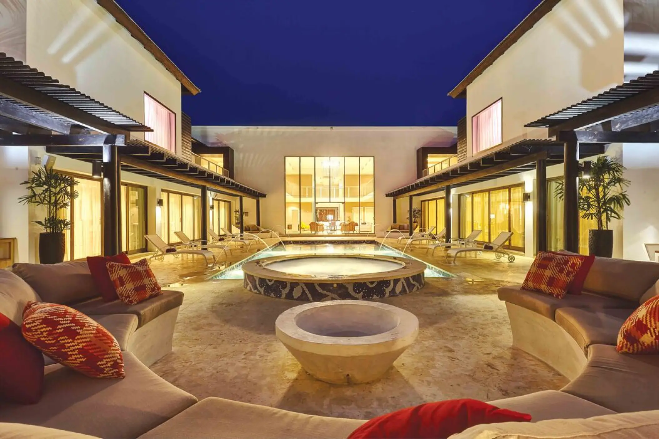 Private CHIC Mansion courtyard with pool and lounge area at Royalton CHIC Punta Cana