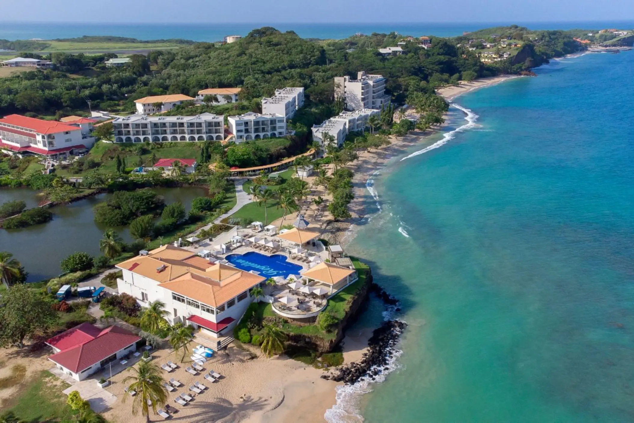 Aerial view of Royalton Grenada beachfront grounds and swimming pools, St. George’s