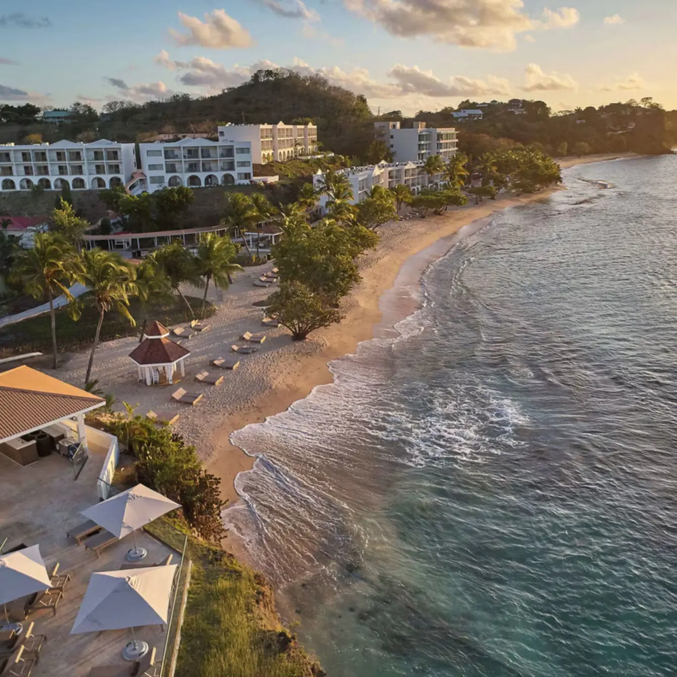 Aerial view of Royalton Grenada beachfront and resort buildings at sunset, St. George’s