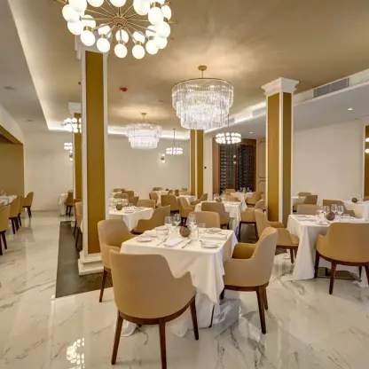 Ma Maison restaurant dining room with elegant chandeliers at Royalton Grenada, St. George’s