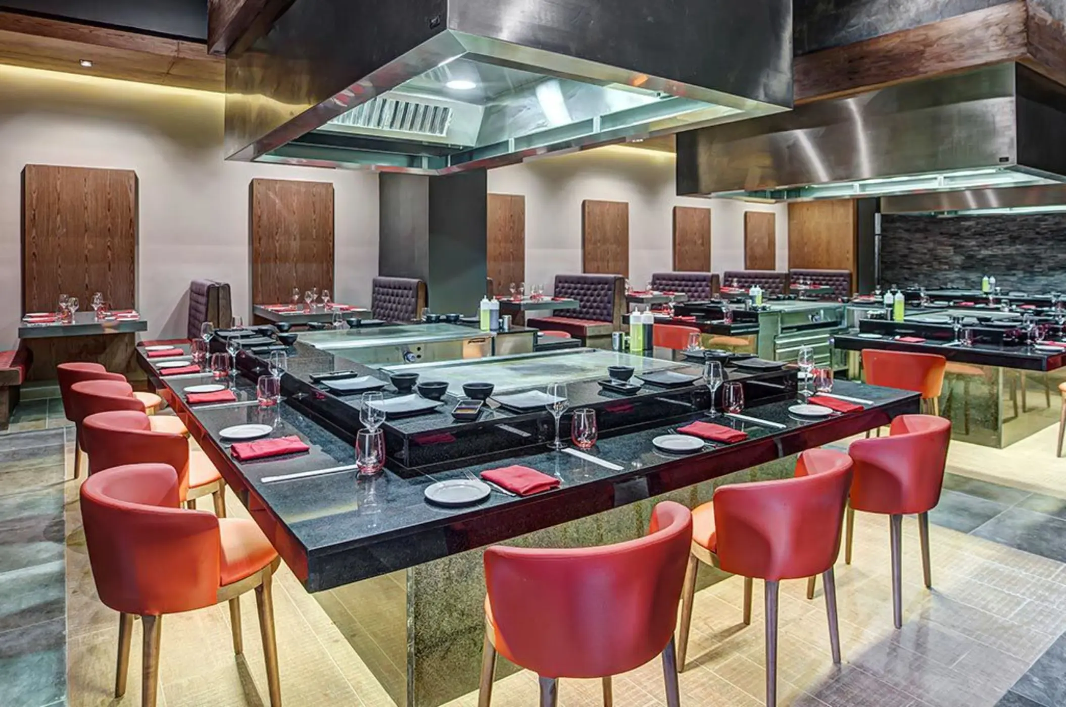 Teppanyaki dining table with red chairs at Royalton Hideaway Saint Lucia, Castries