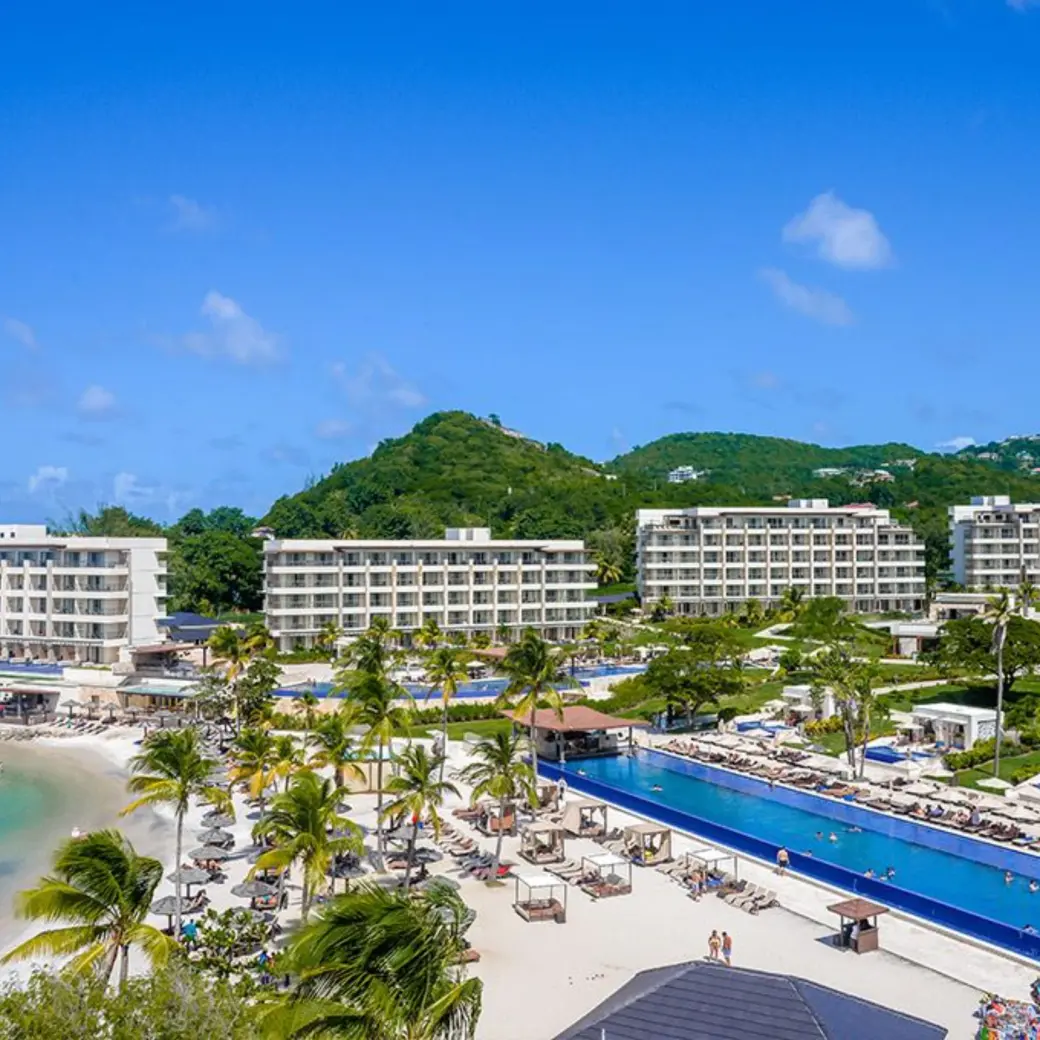 Aerial view of Royalton Hideaway Saint Lucia pools, beach, and guest buildings, Castries