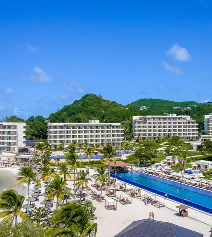 Aerial view of Royalton Hideaway Saint Lucia pools, beach, and guest buildings, Castries