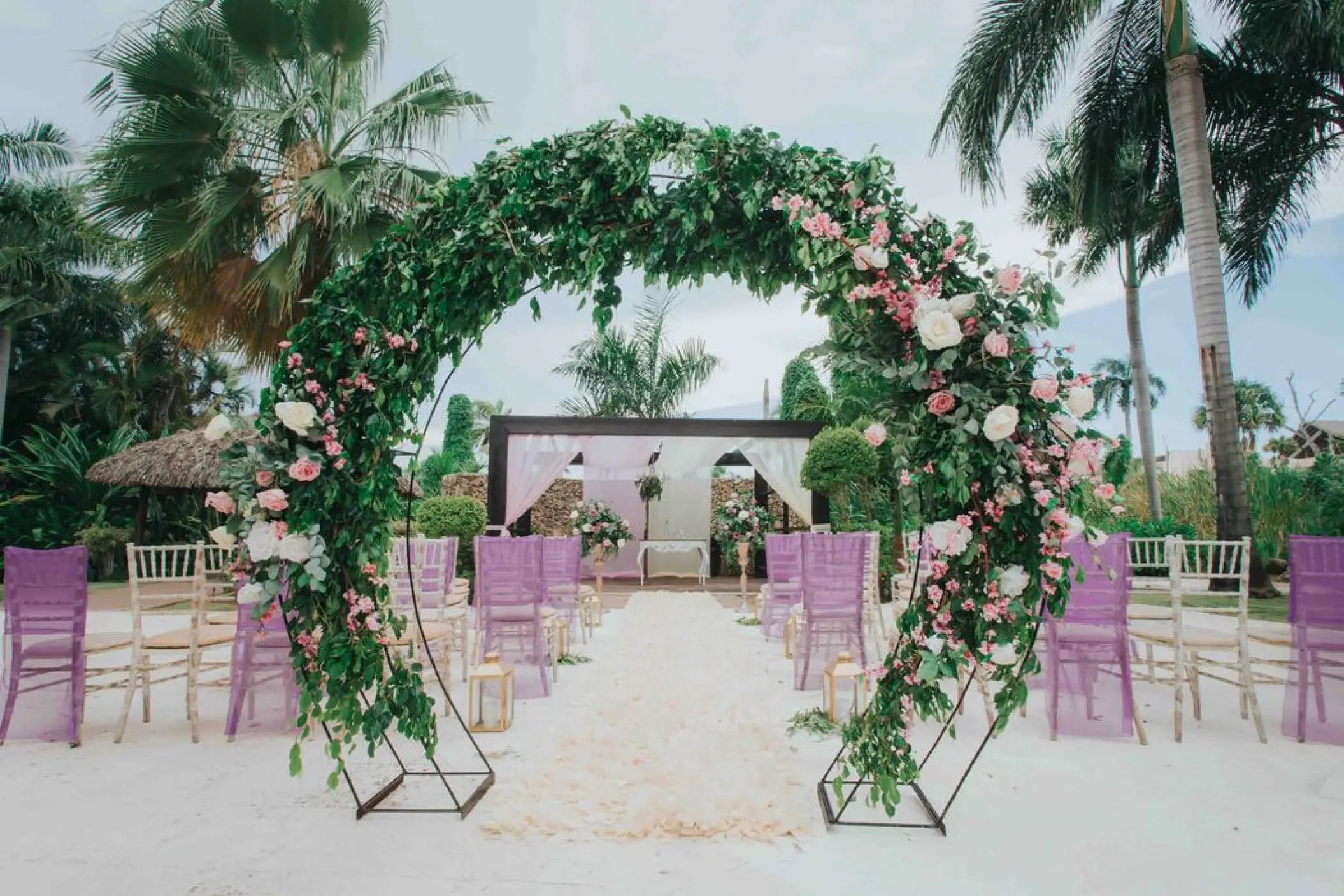 Circular floral arch at an eco garden wedding ceremony in Royalton Punta Cana, Punta Cana