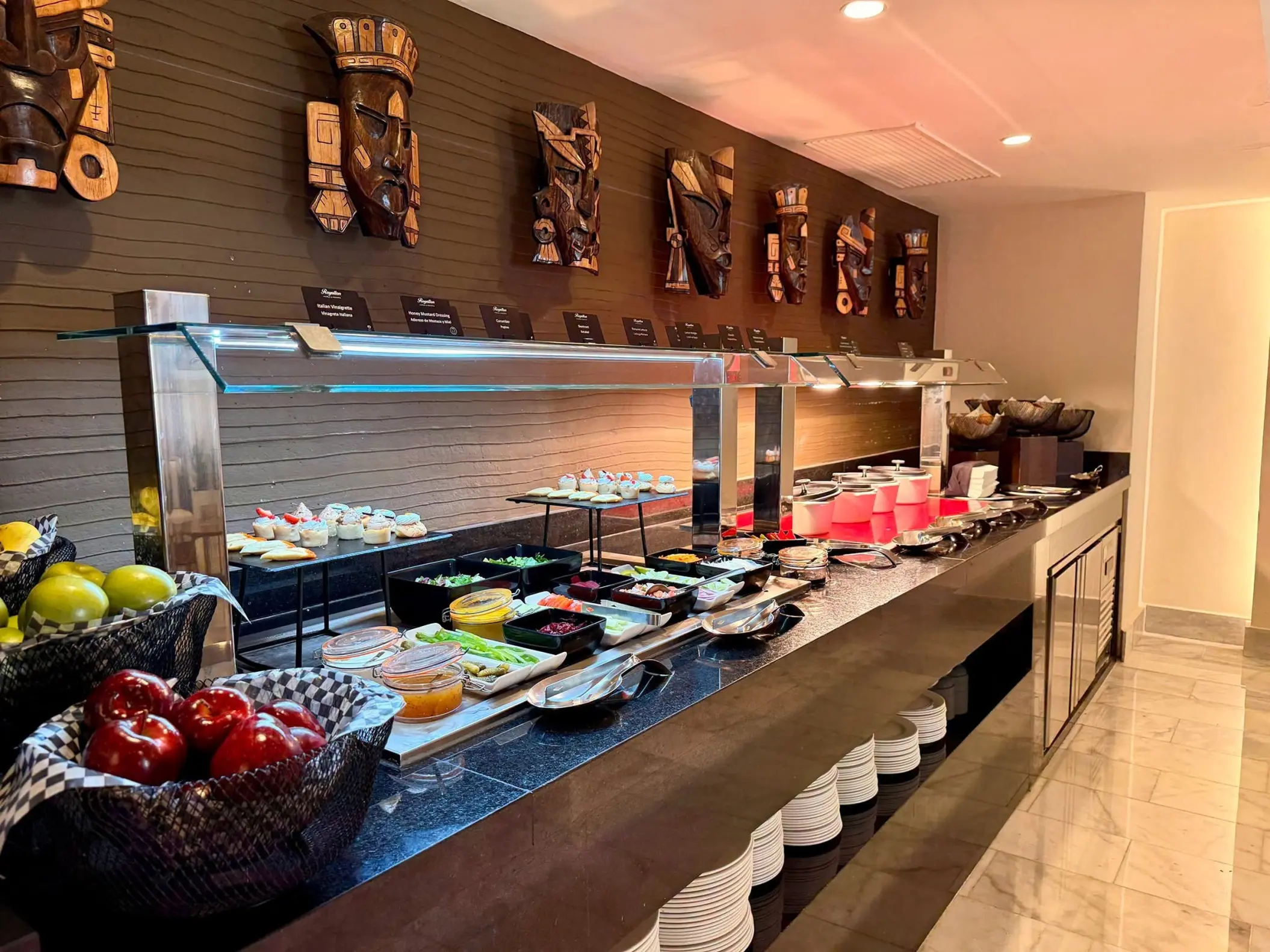 Buffet restaurant station with fresh fruit and appetizers at Royalton Riviera Cancun