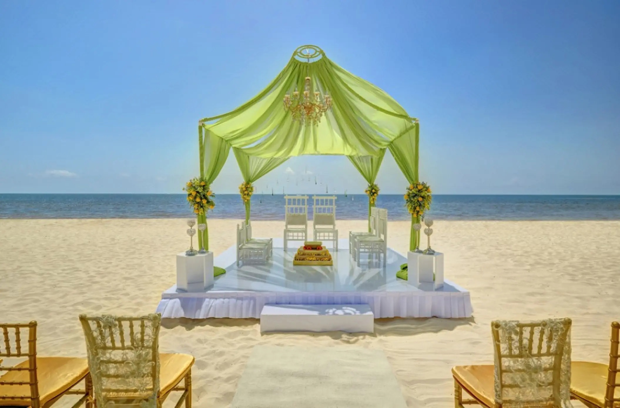 Indian wedding ceremony mandap setup on the beach at Royalton Riviera Cancun