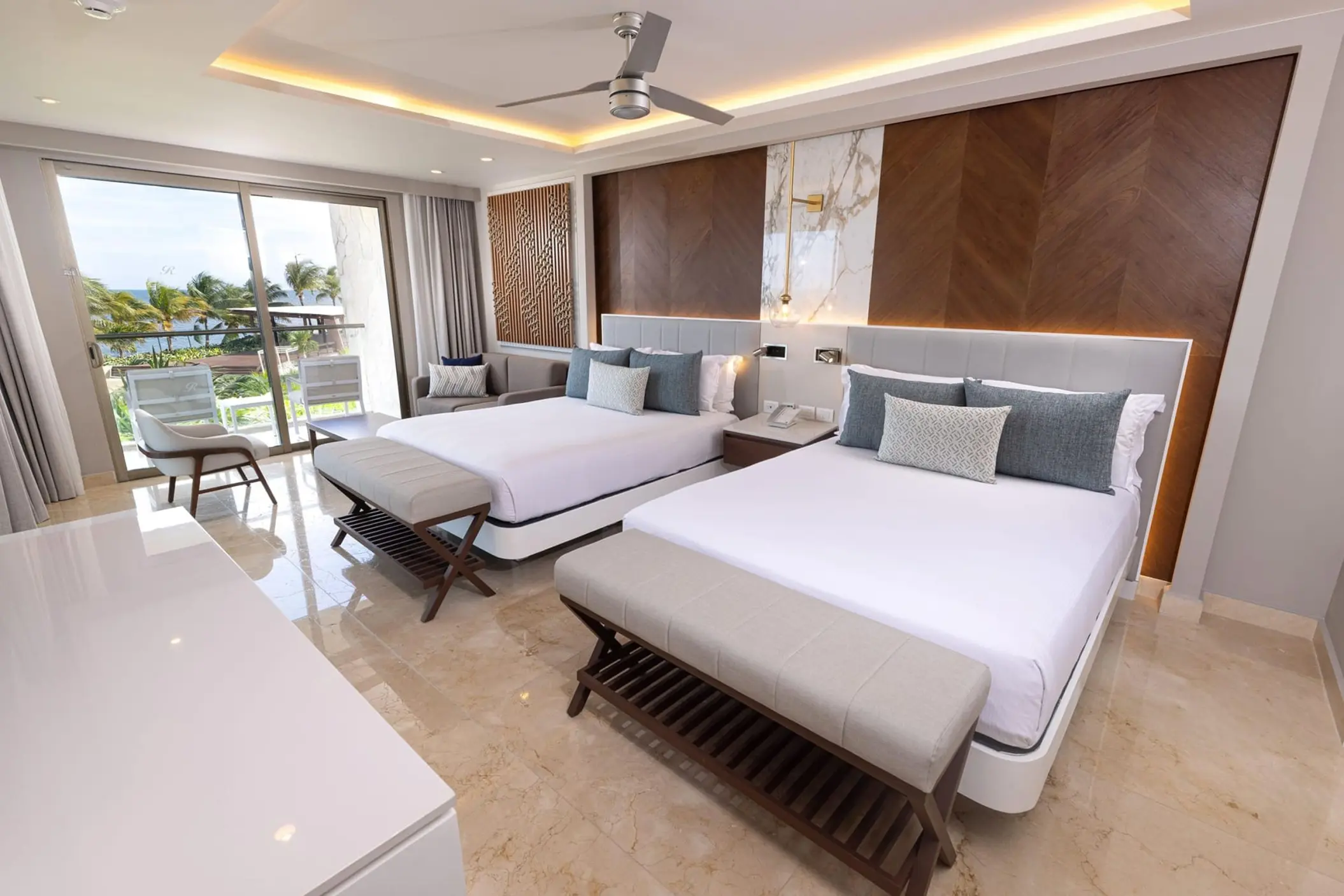 Royalton Riviera Cancun suite with two queen beds and a private balcony, Cancun