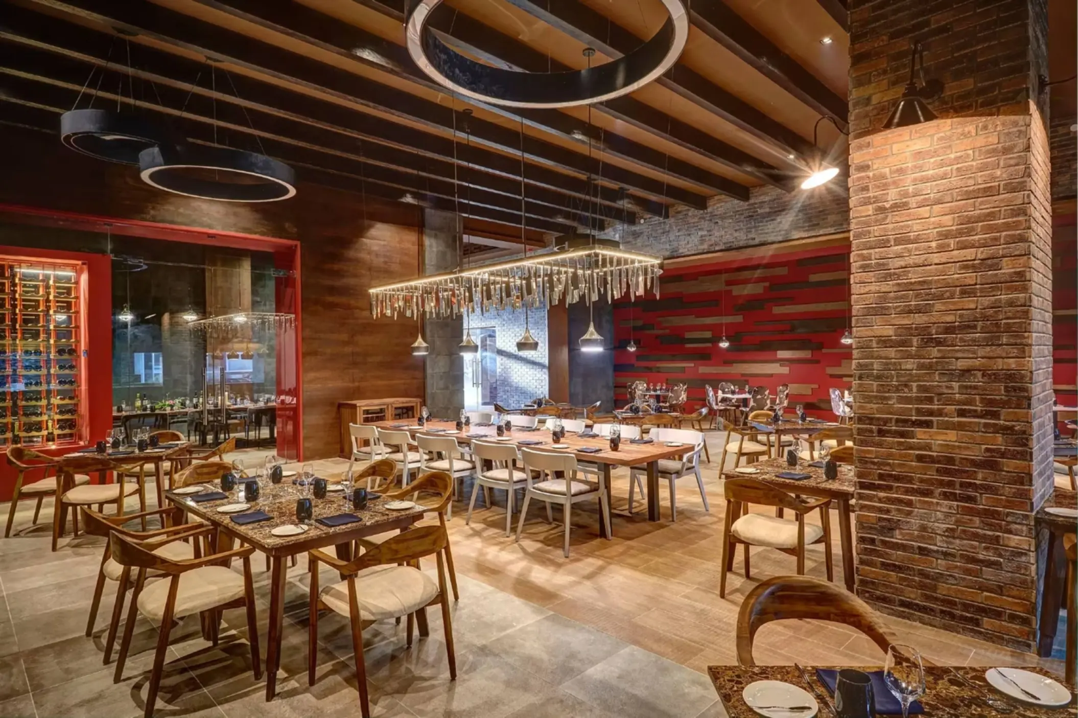 Hunter Steakhouse dining room with brick columns and modern lighting at Royalton Saint Lucia, Castries