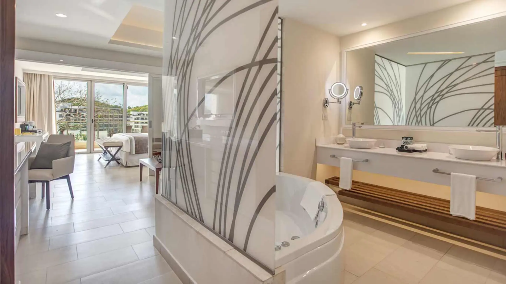 Modern suite bathroom with double vanity and soaking tub at Royalton Saint Lucia, Castries