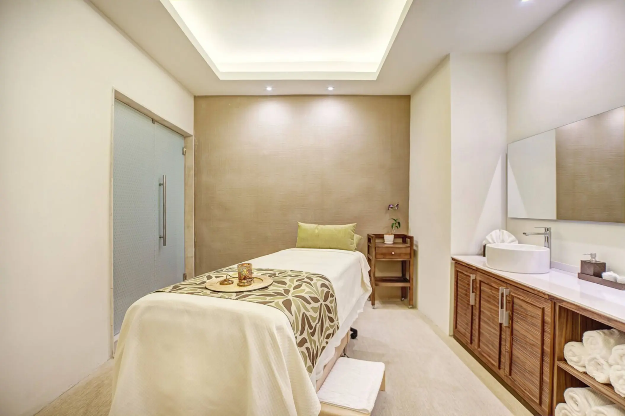 Modern spa treatment room with massage table at Royalton Saint Lucia, Castries